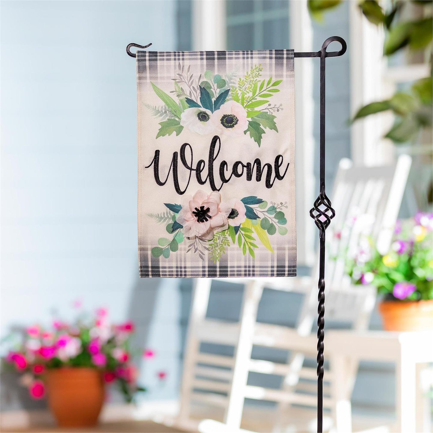 Floral welcome design with bright blooms and greenery