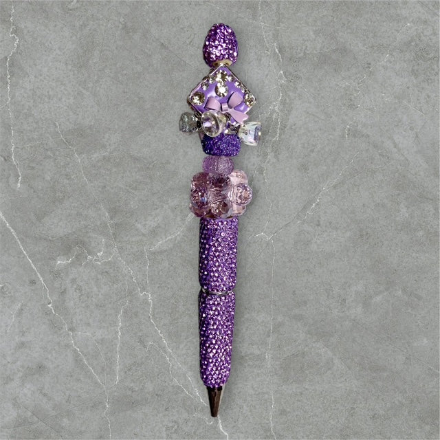 Bows & Bells beaded pen with bow accents and pastel beads