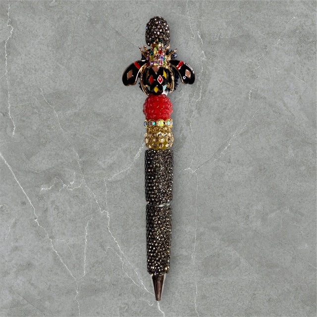 Harlequin Bee in Black beaded pen with bee charm and black?white beads
