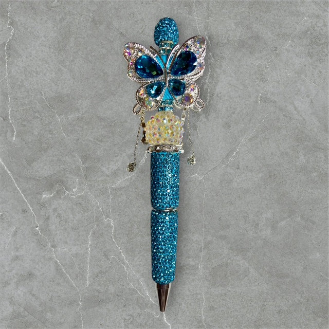 Shimmering in Teal beaded pen with teal beads and shimmering accents