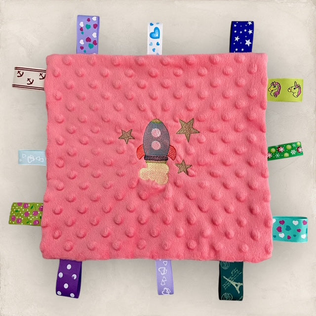 Taggie Toy - Coral with Spaceship