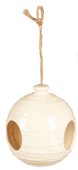 Cream ceramic orb bird feeder shown from alternate angle