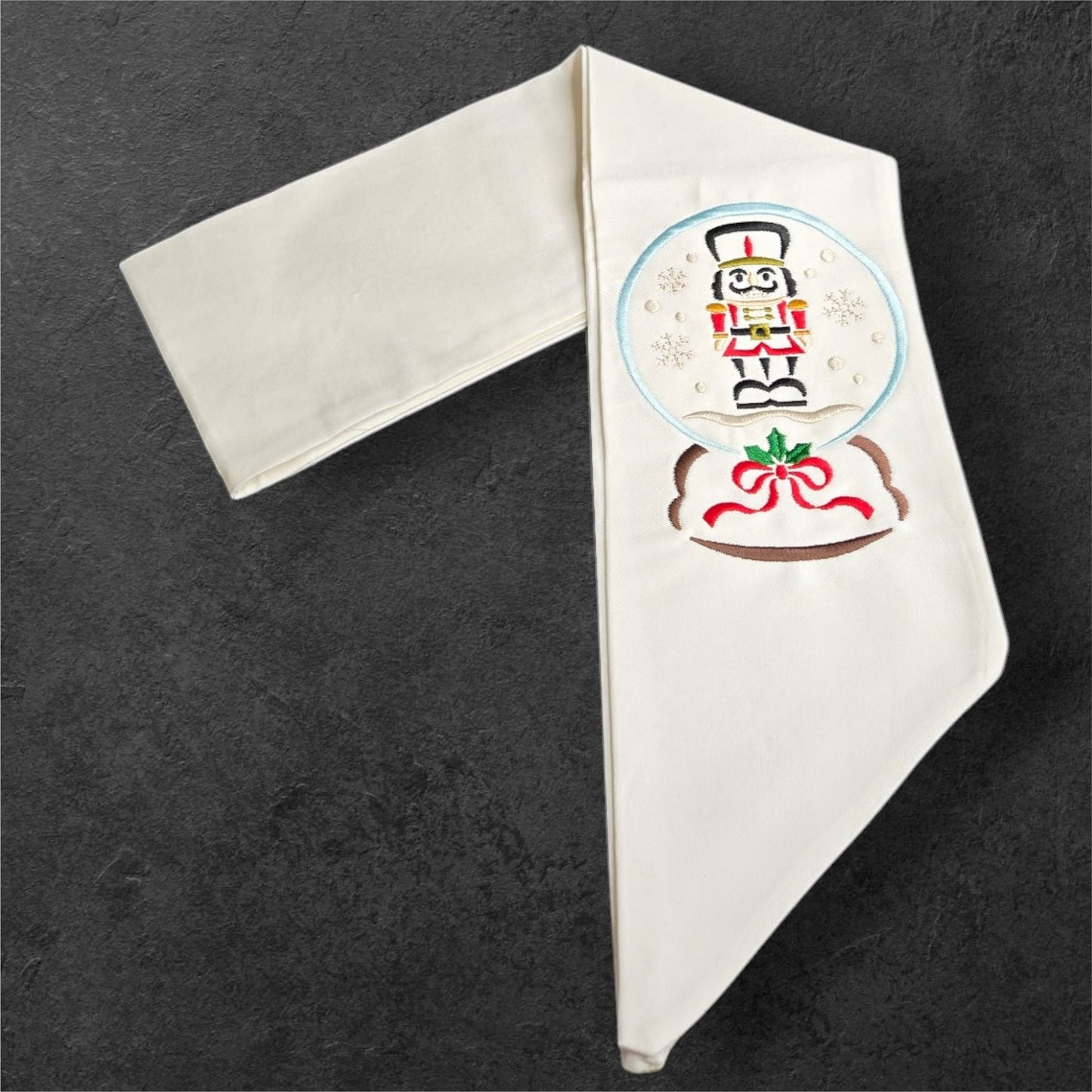 Snow Globe Sentinel wreath sash from The Manor Collection