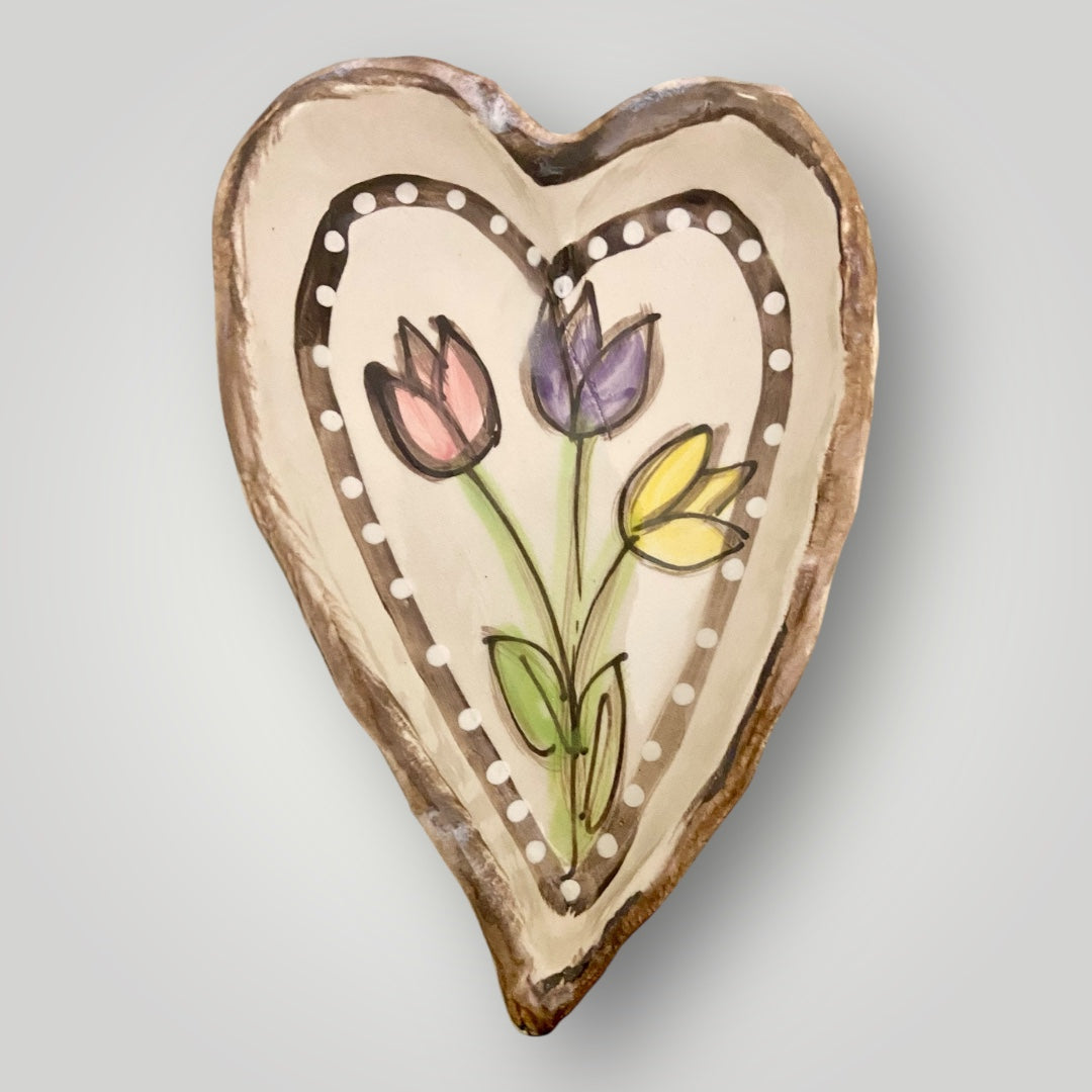 Heart‑shaped pinch bowl with hand‑painted tulips, handmade stoneware by Heartfelt Traditions Pottery