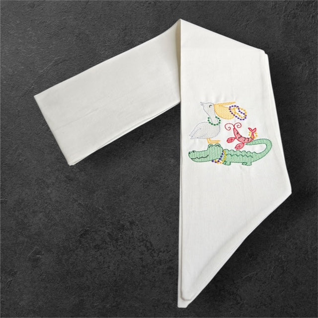 Mardi Gras Bayou Trio wreath sash from The Manor Collection