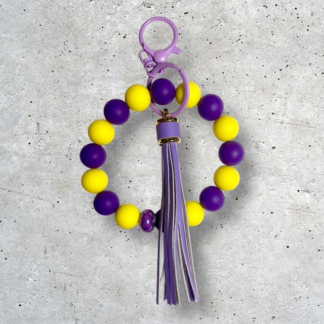 Purple and Gold beaded wristlet keychain with purple tassel