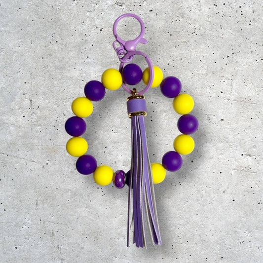 Purple and Gold beaded wristlet keychain with purple tassel
