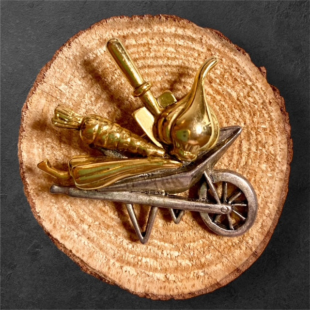 Wheelbarrow brooch with floral wheelbarrow design