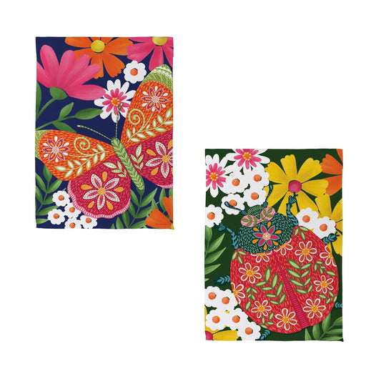 Butterfly and ladybug among colorful blooming flowers